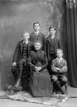 Studio portrait of an unidentified woman and four boys, possibly Christchurch district