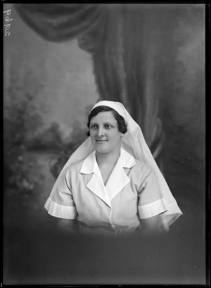 Studio portrait of unidentified woman in nurses uniform, probably Christchurch