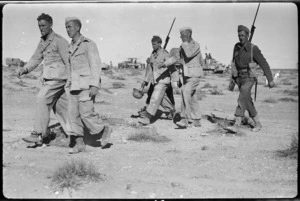 NZ troops bringing in German prisoners in the Western Desert