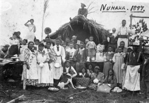 Group outside a whare in Nuhaka