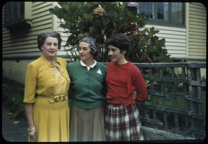 Edna, Gret, and Fran outside a house, New Zealand