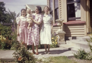 Group at entrance to a house, Riccarton, Christchurch, New Zealand