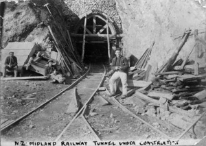 Otira railway tunnel under construction, and workers