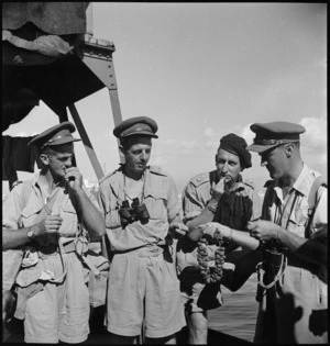 Troops sampling figs on their arrival at a port in Italy, World War II - Photograph taken by M D Elias