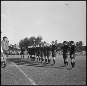 NZ Base rugby team line up with South African Base team before match at Maadi, Egypt, World War II - Photograph taken by George Bull