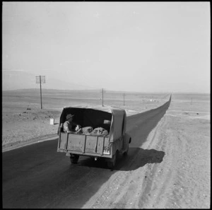 The 'Times' truck on the way to aerodrome to load the paper onto transport planes for delivery in Italy - Photograph taken by George Bull