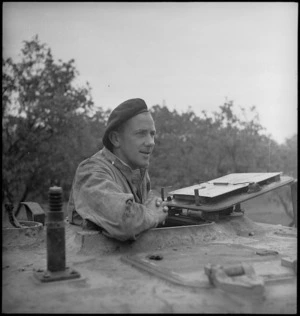 Alan Woods looking from turret of his armoured car near Lucera, Italy, World War II - Photograph taken by George Kaye