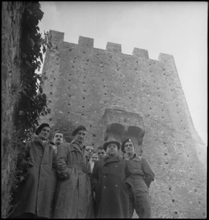 Local inhabitant with New Zealand lieutenants outside the Duke's Palace, Pietramontecorvina, Province of Foggia, a, Italy - Photograph taken by George Kaye