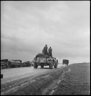 Tire chains fitted to armoured vehicles travelling over muddy Italian roads, World War II - Photograph taken by George Kaye