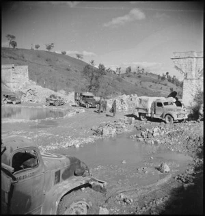Transport crossing a deviation made by NZ Engineers close to Sangro River in Italy, World War II - Photograph taken by George Kaye