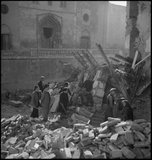 Italian families searching among the ruins of their homes in Atessa, Italy, World War II - Photograph taken by George Kaye