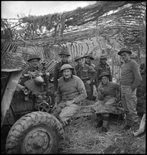 NZ gunners in camouflaged gun pit who have been in action in Sangro River area, Italy, World War II - Photograph taken by George Kaye