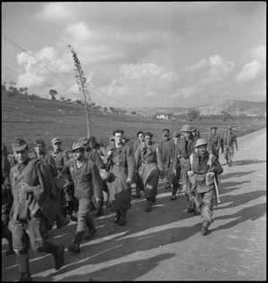 German prisoners captured on the Sangro River front being marched to rear areas by New Zealanders, Italy, World War II - Photograph taken by George Kaye