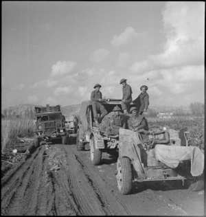 NZ gun crew on their way to forward areas of Sangro River front, Italy, World War II - Photograph taken by George Kaye