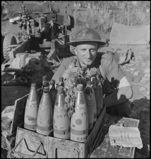 C A Schiske with ammunition stamped 25 pdr, Sangro River Front, Italy, World War II