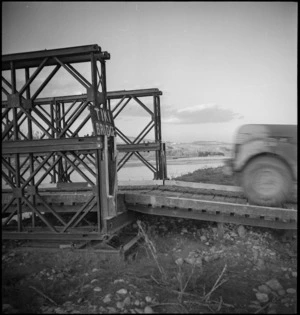 Picture showing the type of approach and decking used on a Bailey bridge, Sangro River, Italy, World War II - Photograph taken by George Kaye