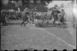 Play in the rugby football match between NZ Base and the Exiles at the Alamein Club in Cairo - Photograph taken by G Bull