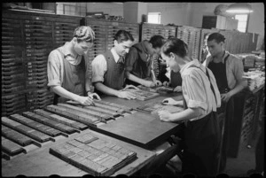 Correcting slugs for the NZEF Times in Cairo, Egypt, World War II - Photograph taken by George Bull