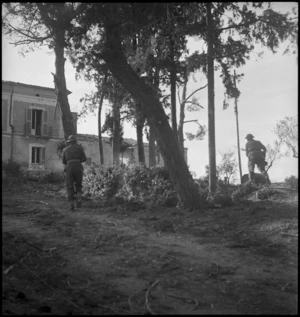NZ Infantry soldiers storm and capture the German HQ at Castelfrentano, Italy, World War II - Photograph taken by George Kaye