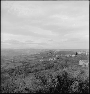 Smoke from enemy shells just beyond the town of Castelfrentano, Italy, during World War II - Photograph taken by George Kaye