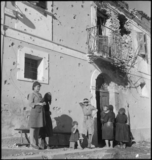 Italian villagers outside their wrecked homes on the Sangro River Front, World War II - Photograph taken by George Kaye