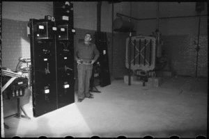 G L S Pawell at main power switches in generating plant at Maadi Camp, Egypt - Photograph taken by George Bull
