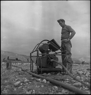 Motor for drawing water from the Sangro River in Italy, World War II - Photograph taken by George Kaye