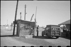Provost Post at entrance to Maadi Camp decorated with Christmas Greetings, Egypt, World War II - Photograph taken by George Bull