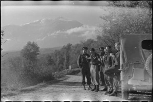 NZ war correspondents and drivers halt by roadside for meal, Italy, World War II - Photograph taken by George Kaye