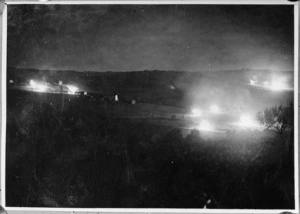 Flashes from night firing of British 4.5 guns on the Sangro River front, Italy, World War II - Photograph taken by G T Blackburn