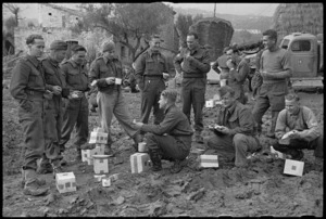 Men of the NZ Division on the Italian Front receive their NZ Patriotic Fund parcels a few day before Christmas, World War II - Photograph taken by George Kaye