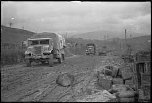 2 NZ Divison transport on the rain soaked and muddy roads of the Italian Front, World War II - Photograph taken by George Kaye