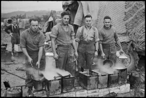 Cooks preparing Christmas dinner in the NZ Division area in Italy, World War II - Photograph taken by George Kaye