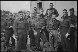 Personnel of New Zealand Division out of the line for Christmas dinner, Italian Front, World War II - Photograph taken by George Kaye