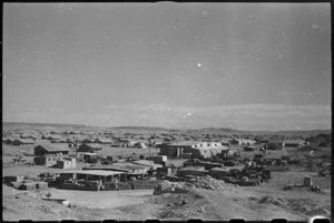 General view of the Garrison Engineers yard with Shafto's Theatre in background, Maadi Camp, Egypt - Photograph taken by George Bull