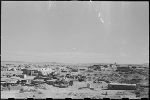 General view of the Garrison Engineers yard with NZ PRS building in the background, Maadi Camp, Egypt - Photograph taken by George Bull
