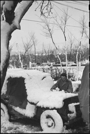 Jeep covered in snow on New Years Day, Italian Front, World War II - Photograph taken by George Kaye