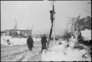 Linesmen of NZ Division in Italy restore communications interrupted by the heavy fall of snow, World War II - Photograph taken by George Kaye
