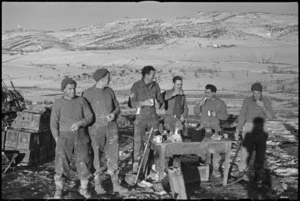 New Zealand gunners on the Italian Front enjoy hot cup of tea, World War II - Photograph taken by George Kaye