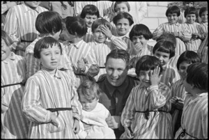 R W Wilson with group of orphan children in Castelfrentano, Italy, World War II - Photograph taken by George Kaye