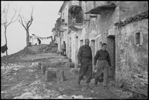 One of the streets in a village where New Zealand Division troops are resting, Italy, World War II - Photograph taken by George Kaye