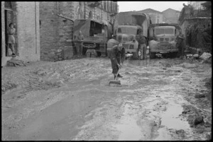 W J Tait showing wet weather conditions in an Italian village, World War II - Photograph taken by George Kaye