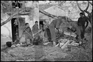 New Zealanders collecting firewood in an Italian village, World War II - Photograph taken by George Kaye