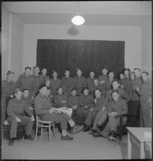 Group of New Zealanders in the Men's Lounge of the NZ Forces Club in Bari, Italy, World War II - Photograph taken by M D Elias