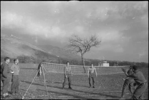 Members of 2 NZ Division playing tennequoits in the Volturno Valley, Italy, World War II - Photograph taken by George Kaye