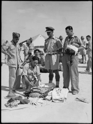 Kit inspection at Maadi for Maori Battalion members prior to departure on NZ Leave Scheme - Photograph taken by G Bull