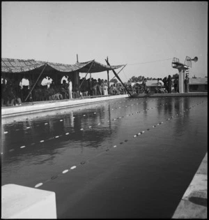 General view of the new baths at Helwan, Egypt, with racing lanes marked on the water - Photograph taken by H Paton