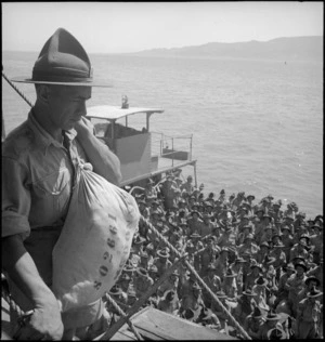 Newly arrived NZ reinforcements disembark by lighter, Port Tewfik, World War II - Photograph taken by S Wemyss