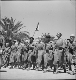 Native troops of French Colonial Forces marching in a parade in Tunis, World War II - Photograph taken by M D Elias