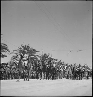 Spahis passing dais during Allied parade in Tunis, World War II - Photograph taken by M D Elias